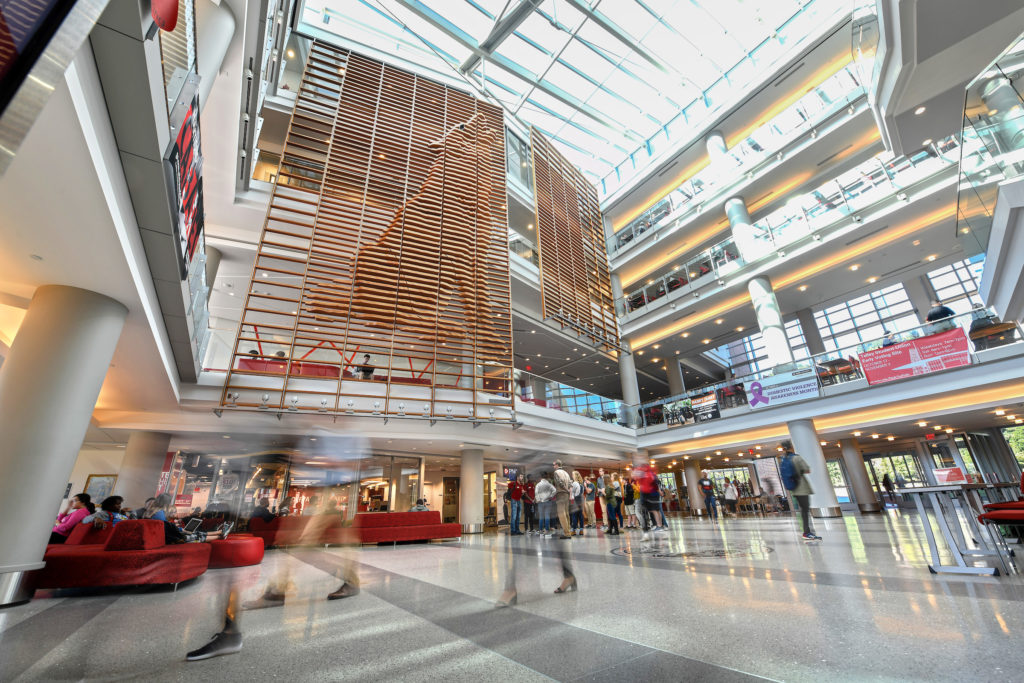 People walk through the lobby of Talley Student Union.